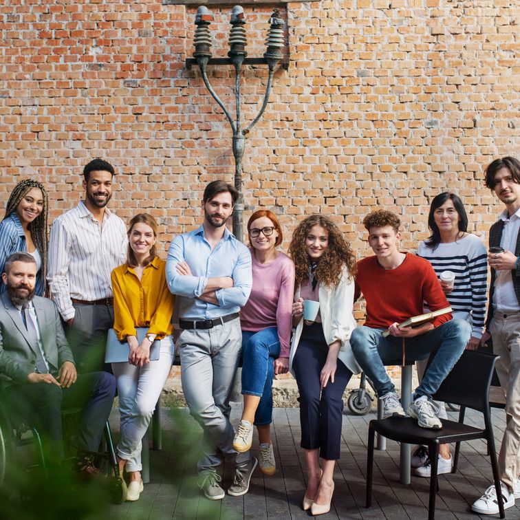Happy diverse group of early adopters, event professionals, and super-connectors who are part of the Clikk community